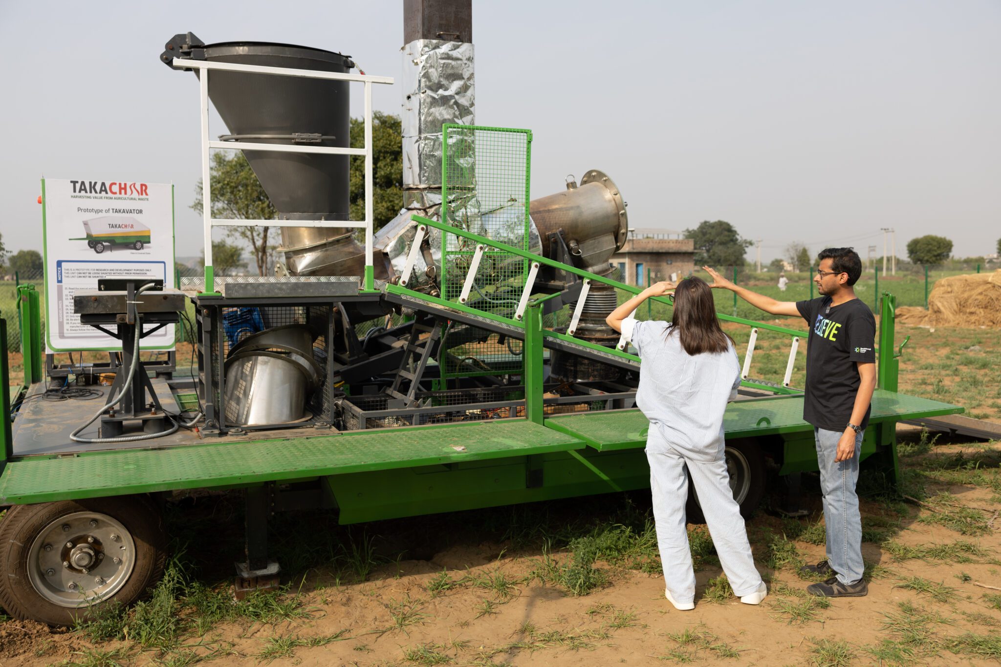 Vidyut Mohan, Co-founder and CEO of Takachar, shows content creator Prajakta Koli Takachar’s groundbreaking technology—a portable machine that attaches to tractors and turns crop waste into biofuels, fertilizers, and other valuable products.