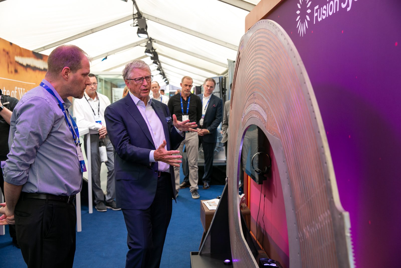 Breakthrough Energy Founder Bill Gates meeting with Commonwealth Fusion Systems in the innovator tent at the Breakthrough Energy Summit.